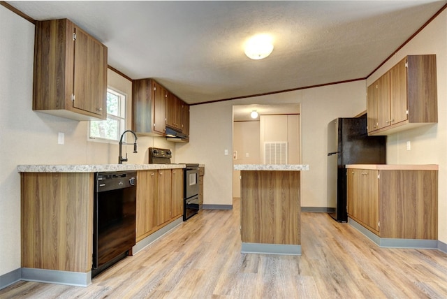 kitchen featuring crown molding, light hardwood / wood-style floors, lofted ceiling, black appliances, and sink