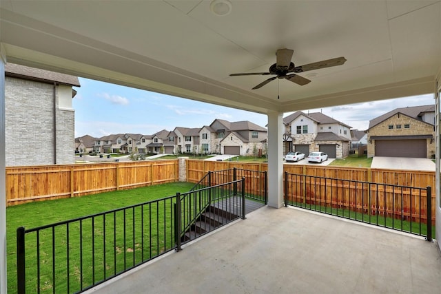 view of patio with ceiling fan