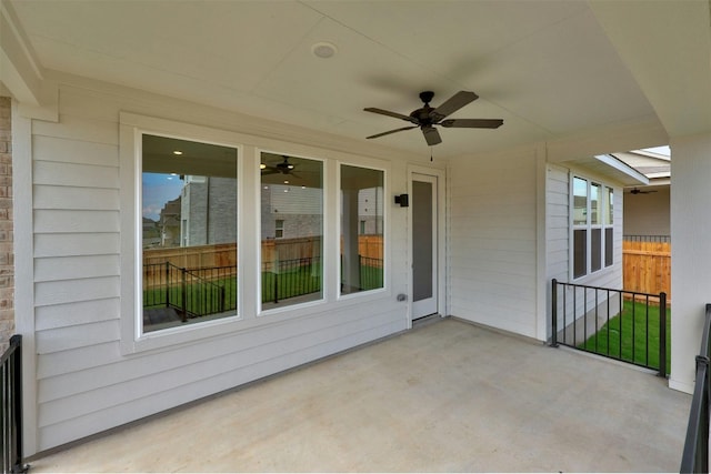 view of patio / terrace featuring ceiling fan