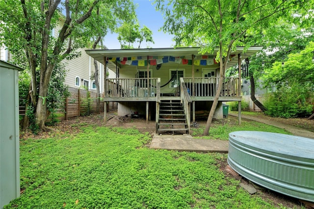 rear view of house with a deck