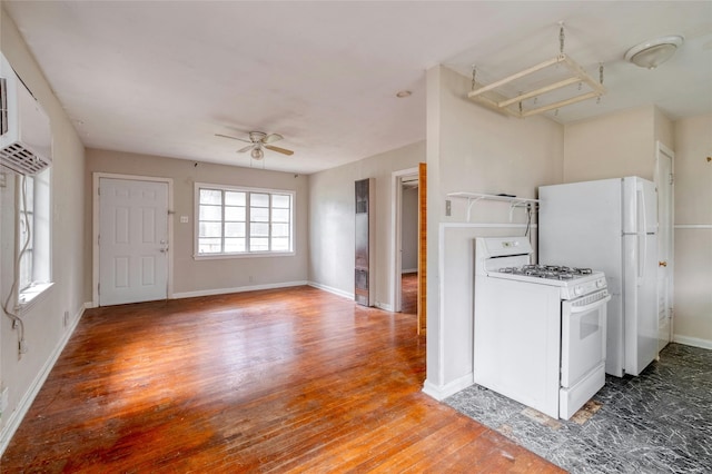 kitchen with ceiling fan, hardwood / wood-style floors, and white appliances