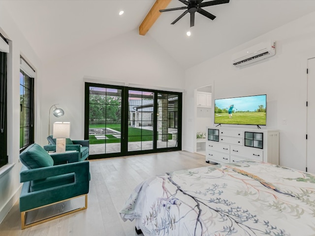 bedroom featuring ceiling fan, light hardwood / wood-style flooring, beam ceiling, a wall mounted air conditioner, and access to exterior