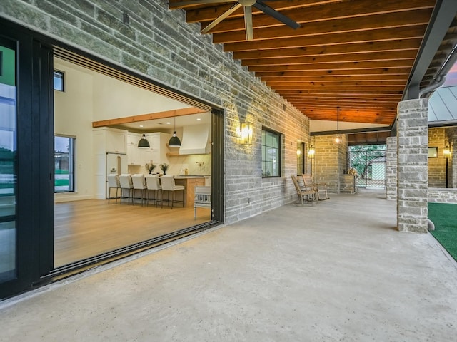 view of terrace featuring ceiling fan