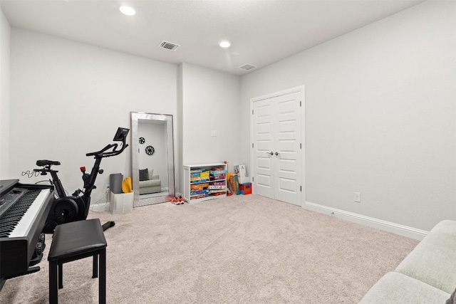 playroom with light colored carpet