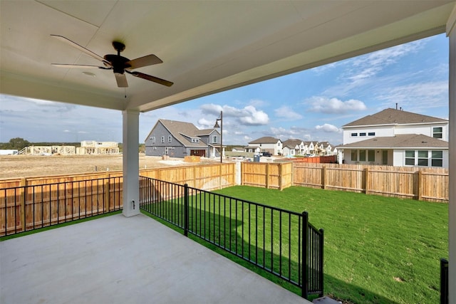 view of patio featuring ceiling fan