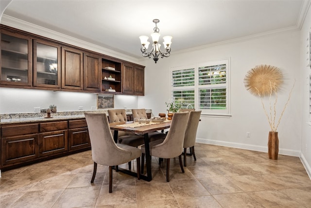 dining area with a notable chandelier and crown molding