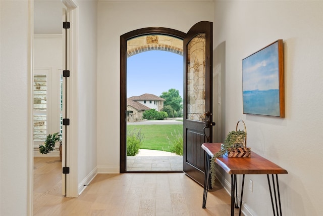 foyer with light hardwood / wood-style floors