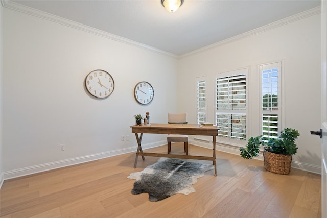 office area with hardwood / wood-style floors and crown molding