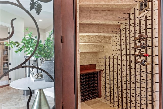 wine room with tile flooring