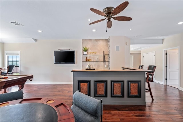 living room featuring billiards, ceiling fan, and dark hardwood / wood-style floors