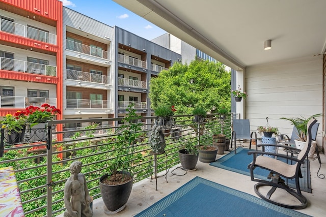 view of terrace with a balcony