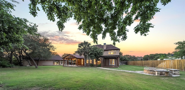 view of front facade featuring a gazebo and a yard