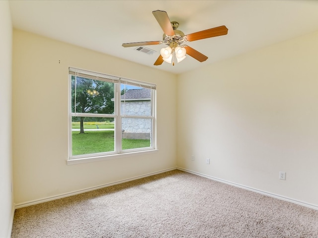 carpeted empty room with ceiling fan