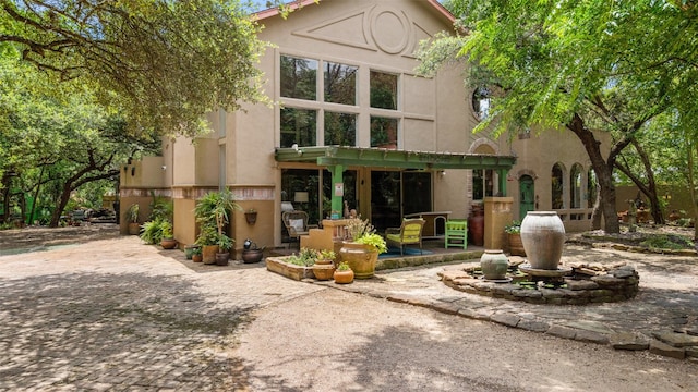 view of front of house featuring a patio