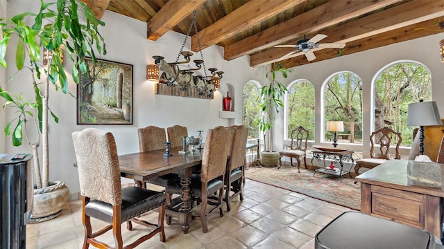 tiled dining space with beamed ceiling, wooden ceiling, and ceiling fan