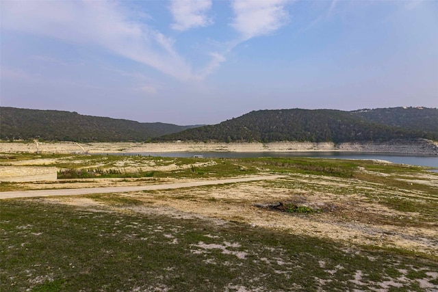 property view of mountains featuring a water view