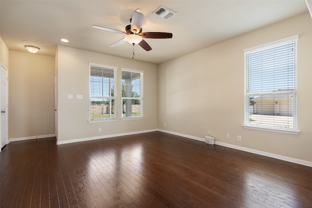 unfurnished room featuring dark hardwood / wood-style flooring and ceiling fan