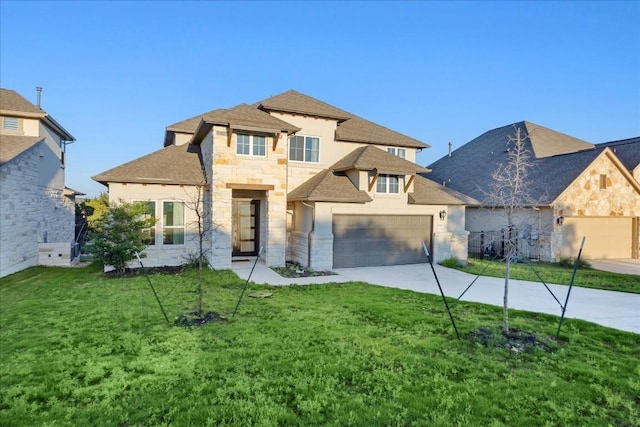 view of front facade featuring a front lawn and a garage