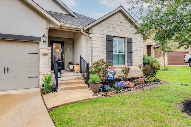 entrance to property featuring a lawn