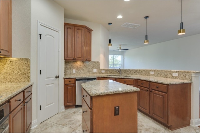 kitchen with a center island, sink, decorative light fixtures, ceiling fan, and stainless steel dishwasher