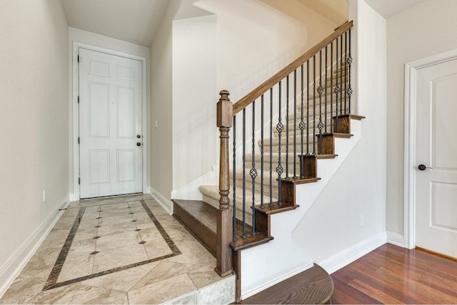 foyer with hardwood / wood-style floors