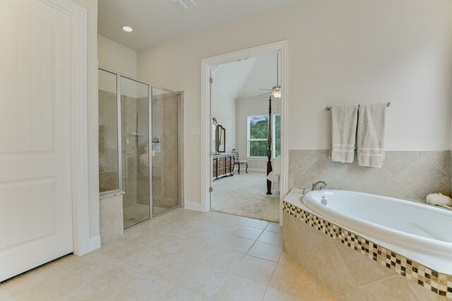 bathroom with tile flooring, separate shower and tub, and ceiling fan