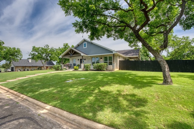 view of front of home with a front yard