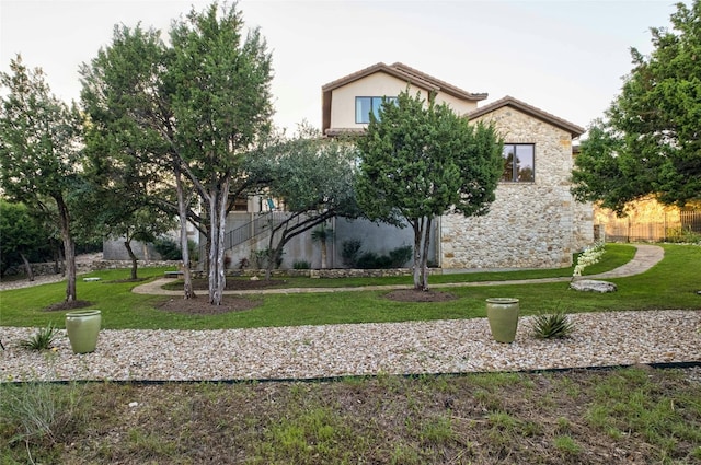 exterior space with a front yard