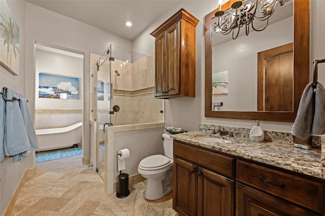 full bathroom with toilet, vanity, and independent shower and bath