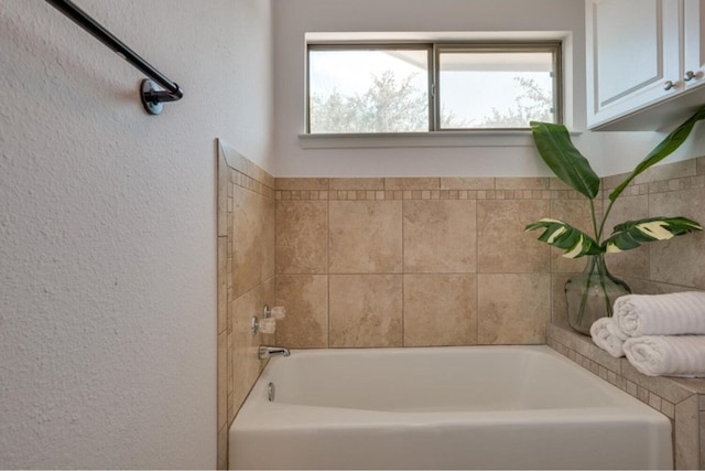 bathroom featuring a tub