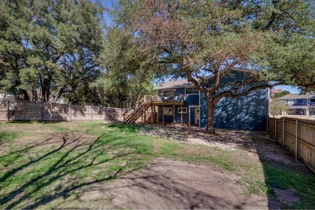 view of yard featuring a wooden deck