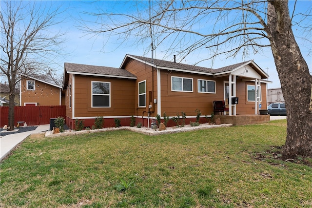 view of front of property with a front yard and central air condition unit