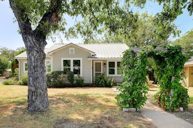 ranch-style house with a front lawn