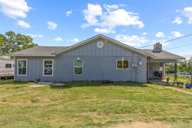 view of property exterior with a yard