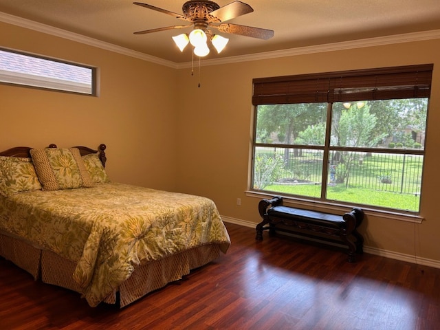 bedroom with ceiling fan, dark hardwood / wood-style flooring, and crown molding