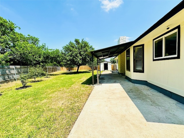 view of yard with a storage shed