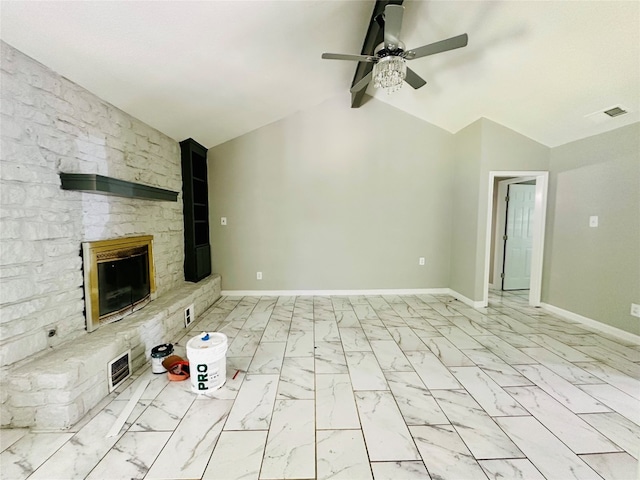 unfurnished living room featuring tile floors, a stone fireplace, ceiling fan, and lofted ceiling