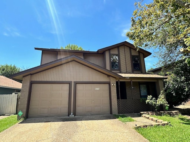 5509 Teri Rd, Austin, TX 78744 - townhome / multi-family property featuring concrete driveway, a garage, brick siding, covered porch, and fence