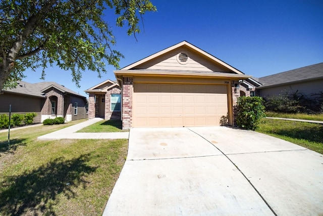 single story home featuring a garage and a front yard