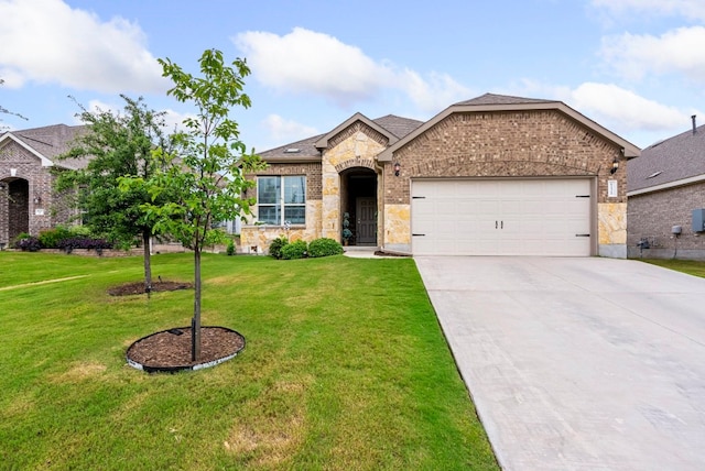 view of front facade with a front lawn and a garage