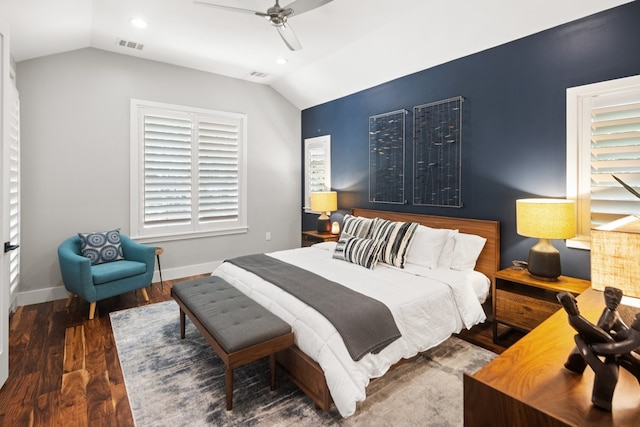 bedroom with vaulted ceiling, dark hardwood / wood-style flooring, and ceiling fan