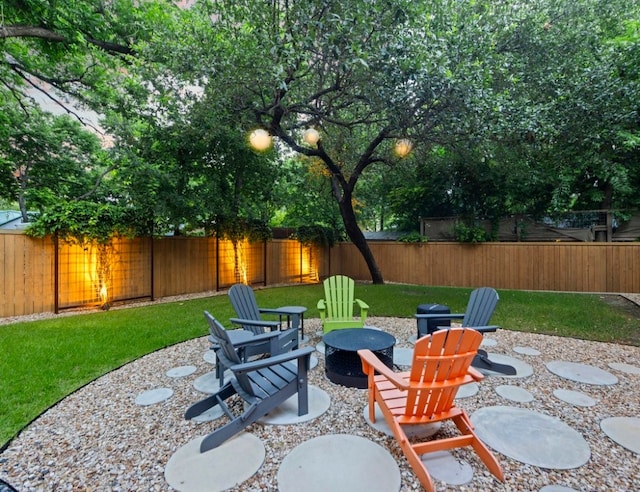 view of patio / terrace with an outdoor fire pit