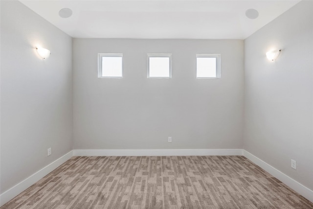 unfurnished room featuring a wealth of natural light