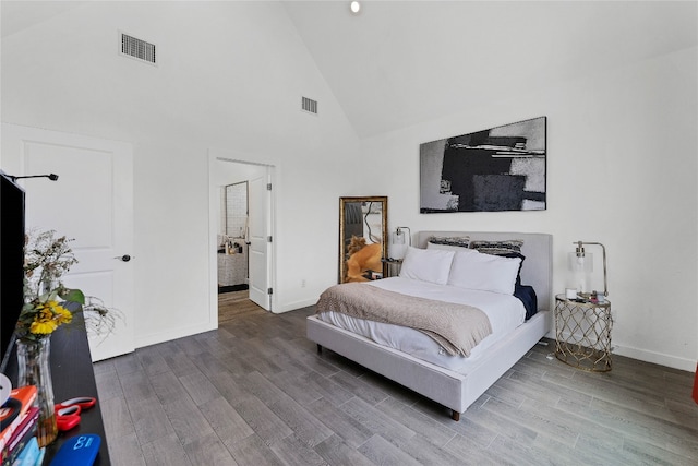 bedroom with high vaulted ceiling and hardwood / wood-style flooring