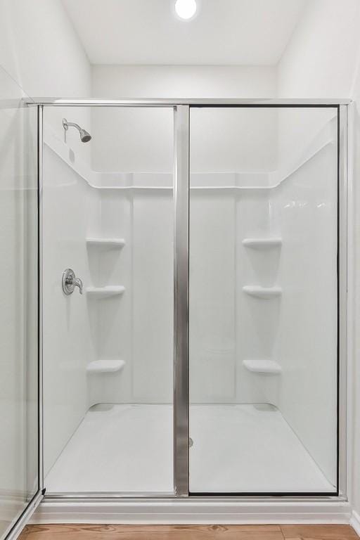 bathroom featuring a stall shower