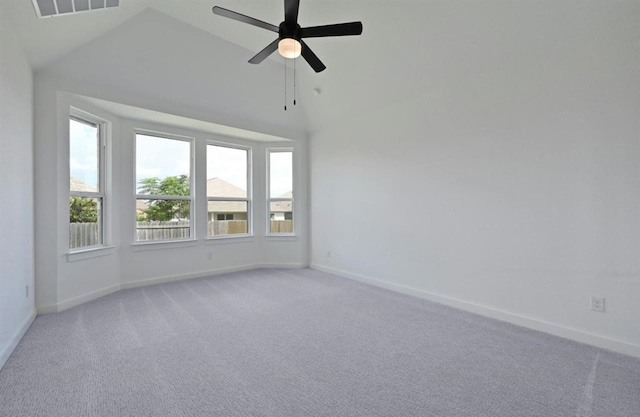 unfurnished room featuring high vaulted ceiling, ceiling fan, and carpet