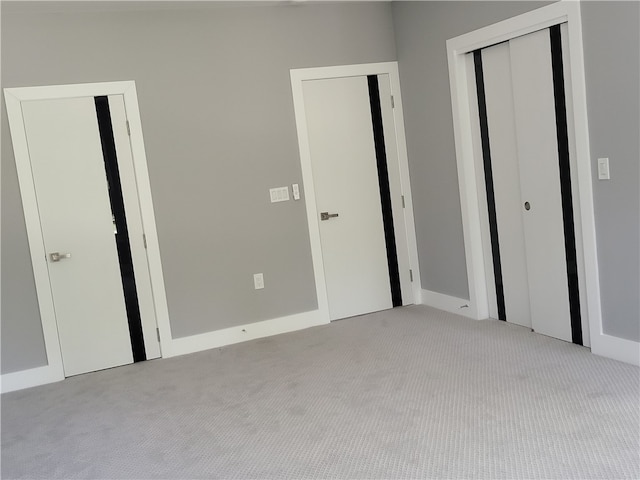 unfurnished bedroom with carpet floors