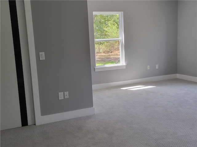 empty room featuring carpet floors