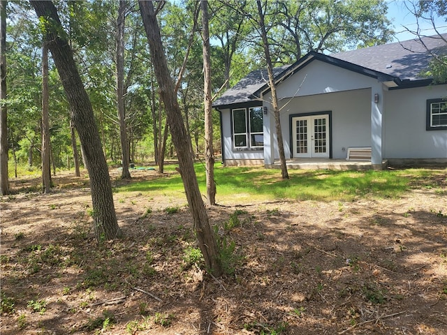 view of home's exterior featuring french doors