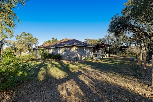 view of home's exterior featuring a yard